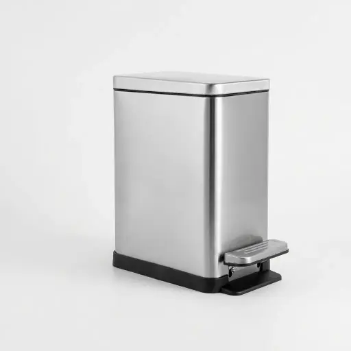 Stainless Steel Rectangle Pedal Dustbin 7L — DBN-1065 — A 7L rectangular pedal dustbin in matte 410 stainless steel with a quiet soft-close lid. The hands-free foot pedal and buffer closing device keep it hygienic and quiet, with a removable liner for easy cleaning. Slim 24x14cm footprint and 31cm tall, available in black, white or silver.