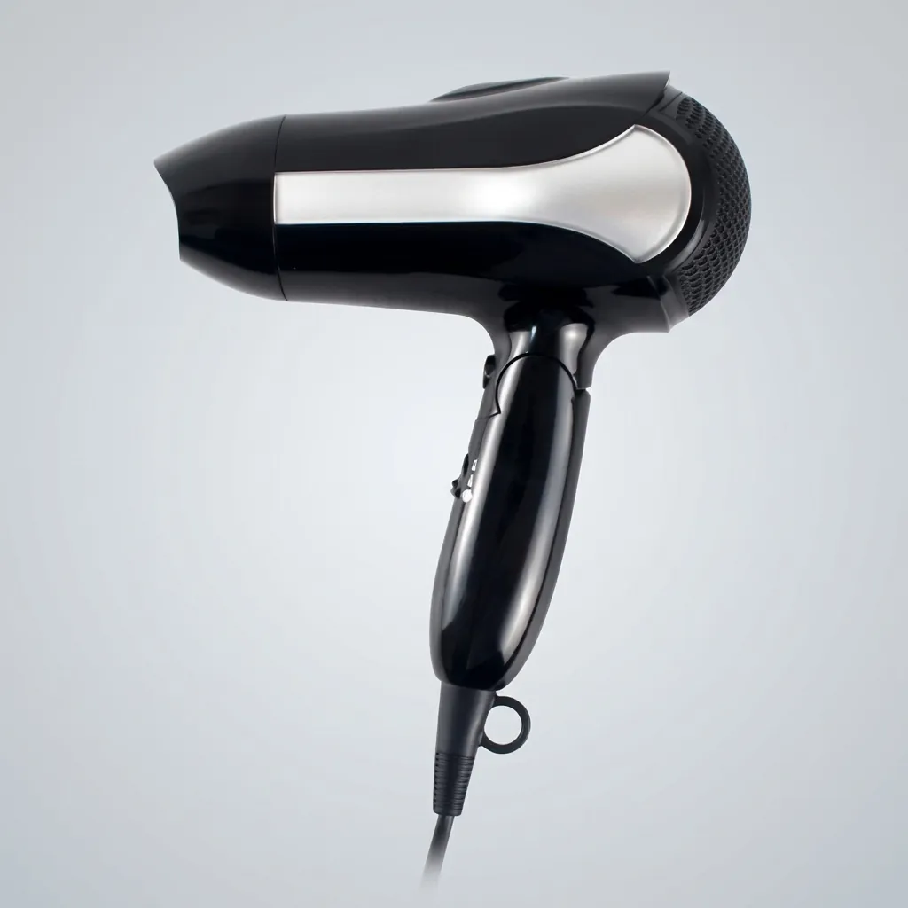 Foldable Hair Dryer 1600W — HDR-1026 — A foldable 1600W hair dryer with three temperature and two speed settings, finished in lustrous silver and black. A hotel safety switch and over-heating protection make it reliable for guest use, while the foldable handle and removable nozzle aid storage. Measures 15.5x8.5x20cm with a 1.8m cord. CE, CB, GCC and RoHS approved. (image 7)