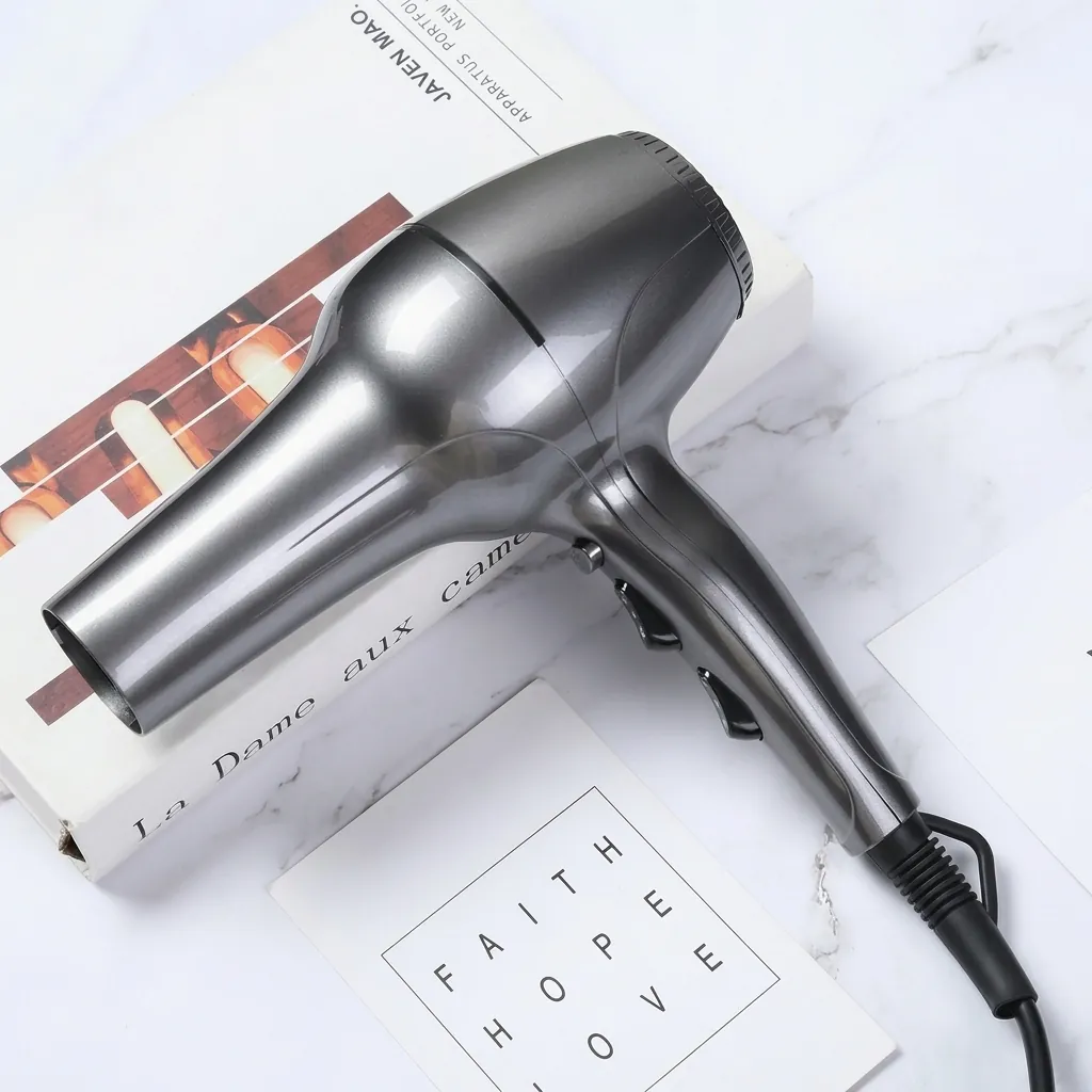 Professional Hair Dryer 1800W — HDR-1060 — A professional 1800W hair dryer with a durable matt finish, two wind speeds and three temperature settings. A strong 16m/s airflow and quiet long-life AC motor deliver fast, dependable drying, backed by a safety switch and overheat protection. The removable nozzle and air filter make cleaning easy, sized at 21x9x27.2cm. CE, CB, GCC and RoHS approved. (image 8)