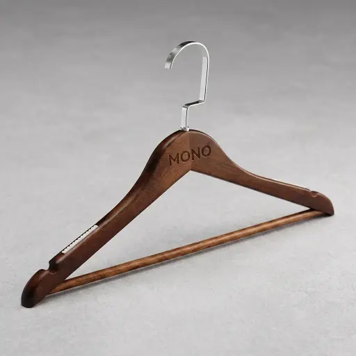 Wooden Clothes Hanger [1036] — HNG-1036 — A black wooden clothes hanger with a non-slip rubber trouser bar that holds garments without creasing. The smooth, sturdy build suits modern guest wardrobes. Measures 44.5cm wide.