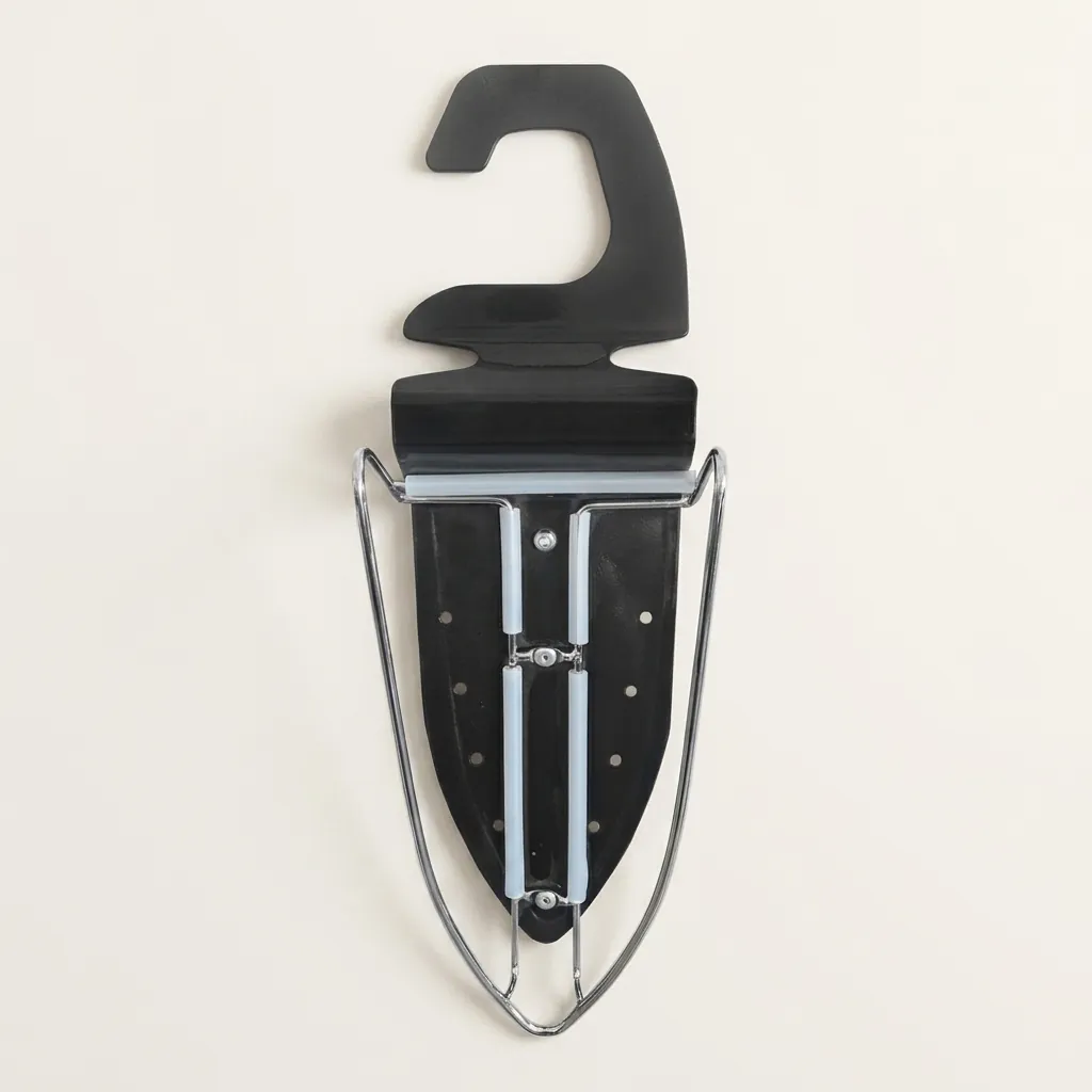 Anti-Theft Ironing Holder [1030] — IRO-1030 — A robust anti-theft ironing holder in durable metal and heat-resistant plastic that stores the iron and board securely. A cable hook conceals the cord while rubberized rails grip the iron in place. Black or silver, 42 x 14 x 13cm. (image 3)