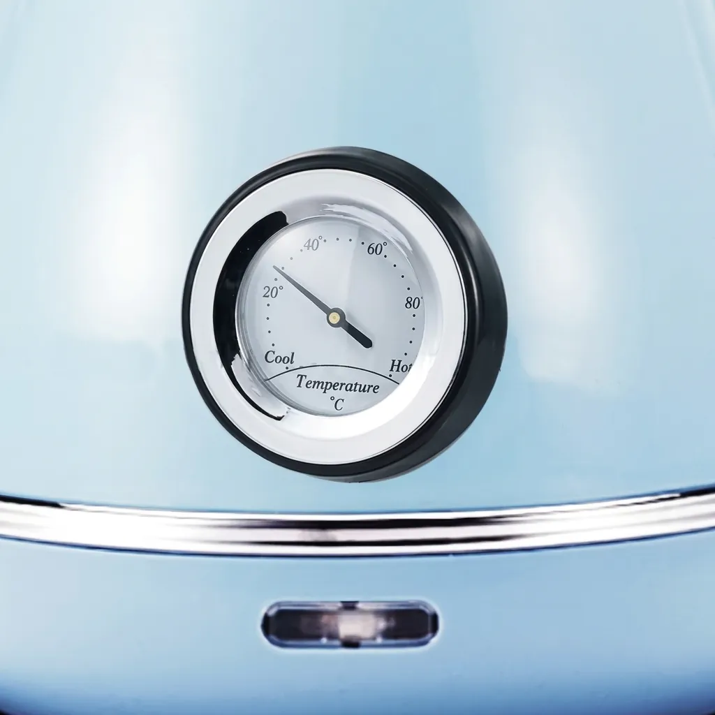 Stainless Steel Royal Electric Kettle 1.7L — KTL-1024 — A vintage-style 1.7L electric kettle in food-grade 304 stainless steel with a high-gloss finish and a large temperature gauge. A 1850 to 2200W branded controller boils fast, with auto shut-off and boil-dry protection for safety. A 360-degree cordless base, water-level indicator and wide lid make it easy to use and clean, available in ivory or blue. (image 4)