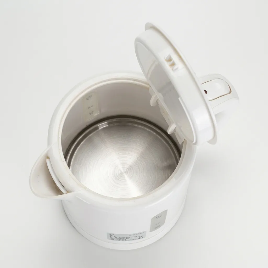 Stainless Steel Electric Kettle 0.8L with Triple Protection [1045] — KTL-1045 — A 0.8L electric kettle in food-grade 304 stainless steel with a durable UK Strix triple-protection controller. Rated 1350W with automatic shut-off, it boils fast and safely for guest rooms. A compact, dependable kettle finished in white. (image 5)