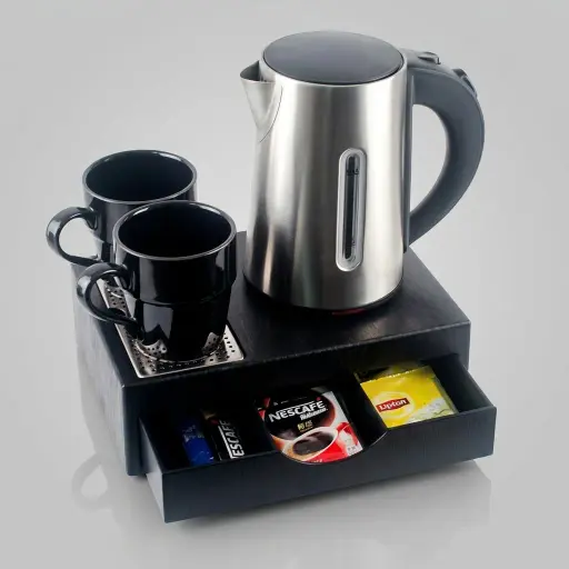 Wood Grain Drawer Tray Set with Stainless Steel 0.8L Kettle [1034] — KTS-1034 — A three-in-one welcome-tray set in wood-grain ABS with a fixed kettle base, deep drawer and three sachet-and-spoon compartments. A removable 304 stainless steel drip tray and space for two cups keep service organised, paired with a 0.8L matt stainless steel kettle. Compact at 26.7x19x8cm, in stainless steel or black.