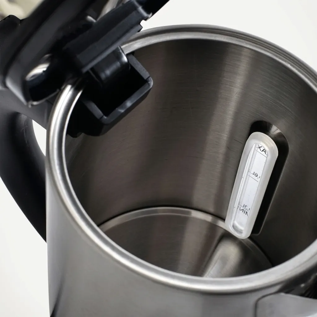 Wood Grain Drawer Tray Set with Stainless Steel 0.8L Kettle [1034] — KTS-1034 — A three-in-one welcome-tray set in wood-grain ABS with a fixed kettle base, deep drawer and three sachet-and-spoon compartments. A removable 304 stainless steel drip tray and space for two cups keep service organised, paired with a 0.8L matt stainless steel kettle. Compact at 26.7x19x8cm, in stainless steel or black. (image 5)
