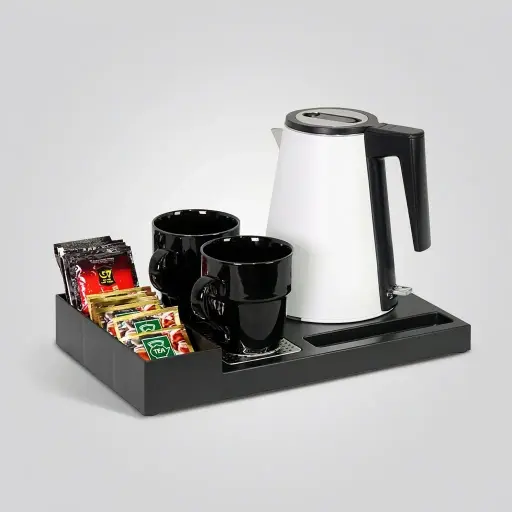 ABS Tray Set with Strix Seamless Stainless Steel 0.8L Kettle [1036] — KTS-1036 — A three-in-one ABS welcome tray with a fixed kettle base, three sachet compartments and a spoon section. A removable 304 stainless steel drip tray and space for two cups keep things tidy, paired with a 0.8L seamless 316 steel Strix kettle. A slim 35x20.4x5cm tray, available in black or white.