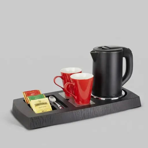 Wood Grain Tray Set with Stainless Steel Anti-Scald 0.8L Kettle [1050] — KTS-1050 — A three-in-one wood-grain ABS welcome tray with a fixed kettle base, four sachet-and-spoon compartments and a removable 304 stainless steel drip tray. Rounded corners ease cleaning, paired with a 0.8L anti-scald double-body kettle. A generous 38.5x30.5cm tray, finished in black.