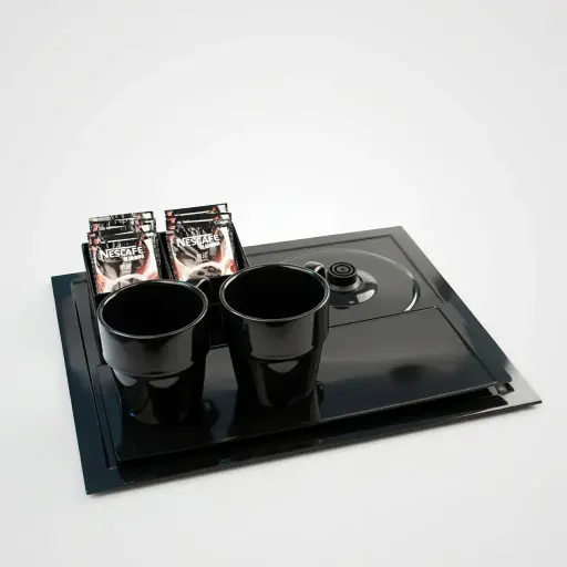 Melamine Tray Set with Strix Stainless Steel 1.2L Kettle [1061] — KTS-1061 — A melamine welcome-tray set with a main tray, four-compartment tea box and matching serving tray in strong, fire-resistant non-crack melamine. The polished surface is easy to clean, paired with a 1.2L Strix-controlled stainless steel kettle. The main tray measures 38.5x32.5cm, finished in black.