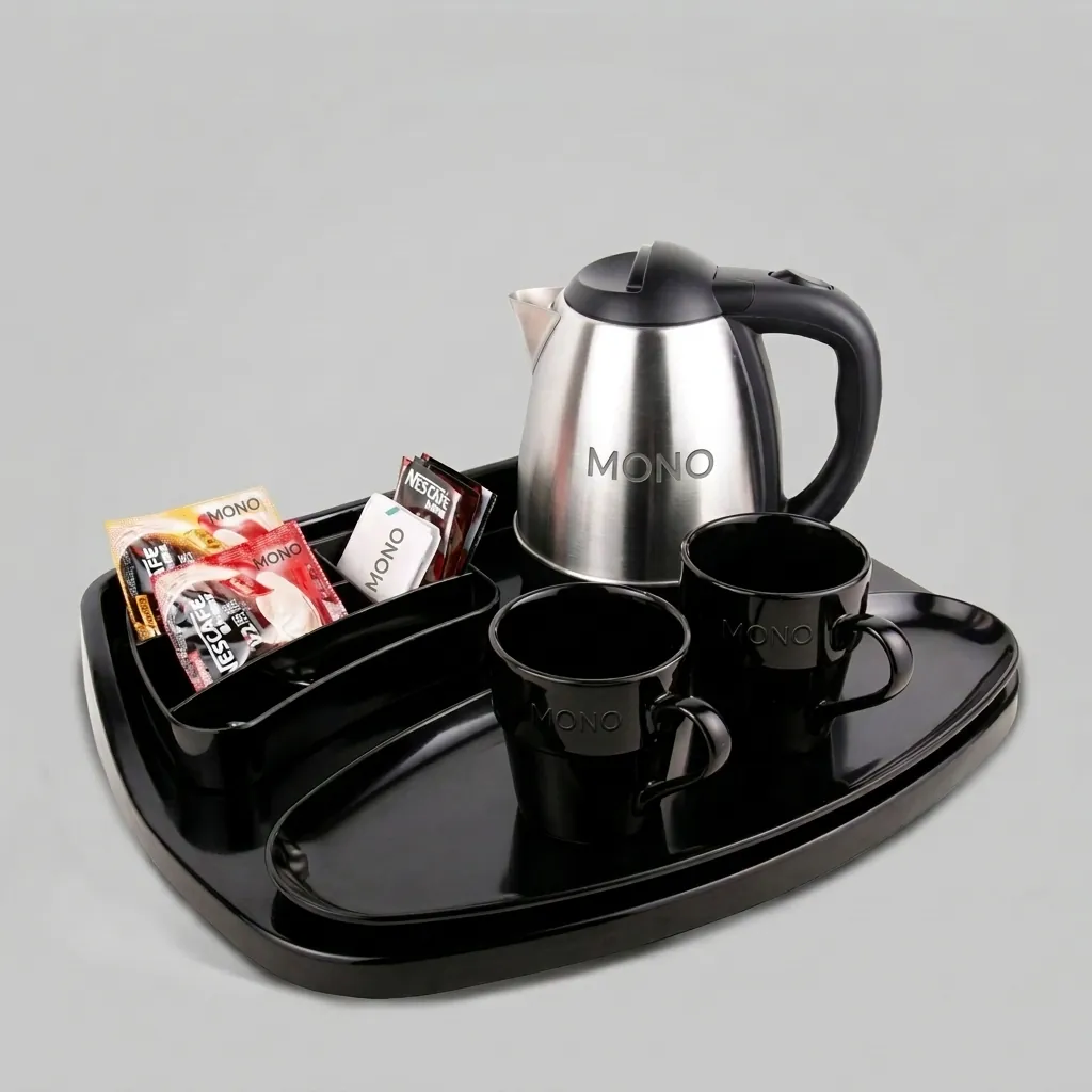 Melamine Tray Set with Stainless Steel 1.2L Kettle with Spout Strainer [1074] — KTS-1074 — A premium melamine welcome-tray set with a large main tray, four-compartment tea box and matching serving tray in strong, fire-resistant non-crack melamine. The polished surface wipes clean easily, paired with a 1.2L stainless steel kettle featuring a spout strainer. The roomy main tray measures 46.2x36.9cm, finished in black. (image 1)