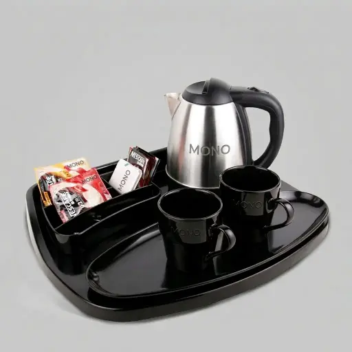 Melamine Tray Set with Stainless Steel 1.2L Kettle with Spout Strainer [1074] — KTS-1074 — A premium melamine welcome-tray set with a large main tray, four-compartment tea box and matching serving tray in strong, fire-resistant non-crack melamine. The polished surface wipes clean easily, paired with a 1.2L stainless steel kettle featuring a spout strainer. The roomy main tray measures 46.2x36.9cm, finished in black.