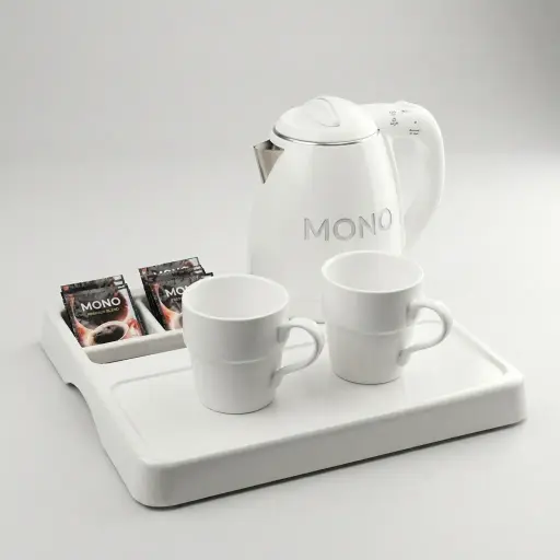 Melamine Tray Set with Strix Stainless Steel 1.2L Kettle [1076] — KTS-1076 — A melamine welcome tray in strong, fire-resistant non-crack melamine with an integrated kettle base, three sachet-and-spoon compartments and space for cups. The polished surface wipes clean easily, paired with a 1.2L double-body Strix stainless steel kettle. A 36.5x34cm tray finished in white.