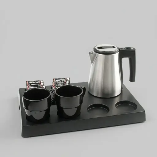 ABS Tray Set with Strix Stainless Steel 0.6L Kettle [1088] — KTS-1088 — A three-in-one matt ABS welcome tray with a fixed kettle base, three sachet-and-spoon compartments and space for four cups. Rounded corners ease cleaning, paired with a 0.6L Strix-controlled stainless steel kettle. A 40.5x26.8cm tray, in stainless steel or black.