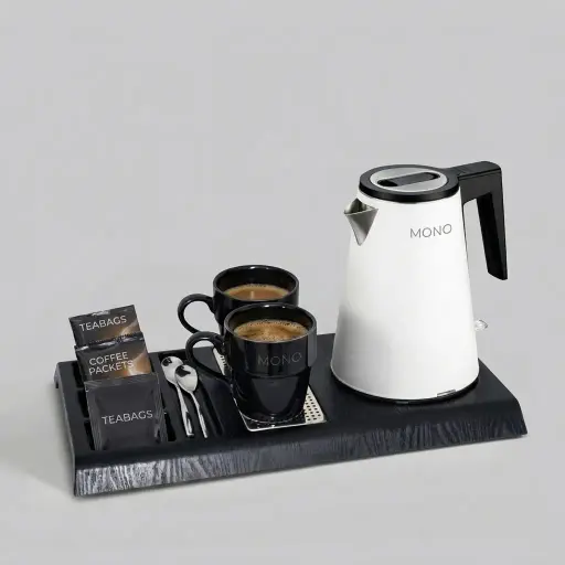 Wood Grain Tray Set with Strix Seamless Stainless Steel 0.8L Kettle [1101] — KTS-1101 — A three-in-one wood-grain ABS welcome tray with a fixed kettle base, four sachet-and-spoon compartments and a removable 304 stainless steel drip tray. Rounded corners keep it easy to clean, paired with a 0.8L seamless 316 steel Strix kettle. A 44.3x22.7cm tray, available in black or white.