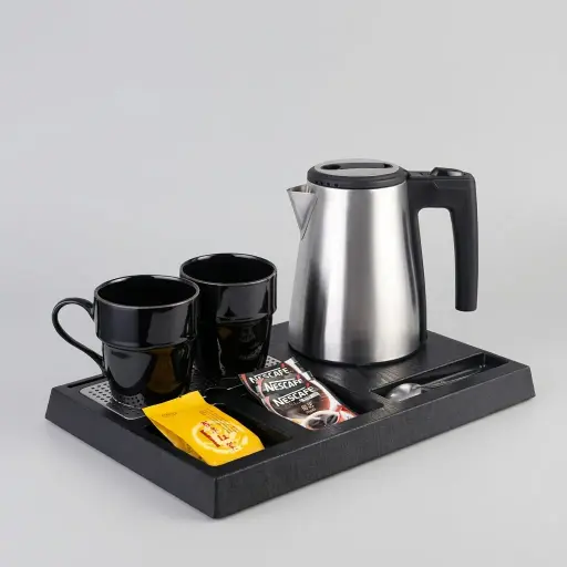 Wood Grain 3-in-1 Tray Set with Strix Stainless Steel 0.6L Kettle [1110] — KTS-1110 — A three-in-one wood-grain ABS welcome tray with a fixed kettle base, three sachet-and-spoon compartments and a removable 304 stainless steel drip tray. Rounded corners make it easy to clean, paired with a 0.6L Strix-controlled stainless steel kettle. A compact 36.3x24cm tray, in stainless steel or black.