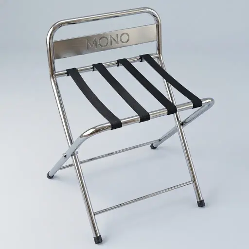 Folding Luggage Rack With Backrest Stainless Steel — LGR-1025 — A folding luggage rack with a strong metal frame, four durable nylon straps and a backrest that protects the wall and holds an open suitcase lid. It folds up easily for compact storage and sets up in seconds. Measures 550x500x700mm, available in black, silver or chrome.