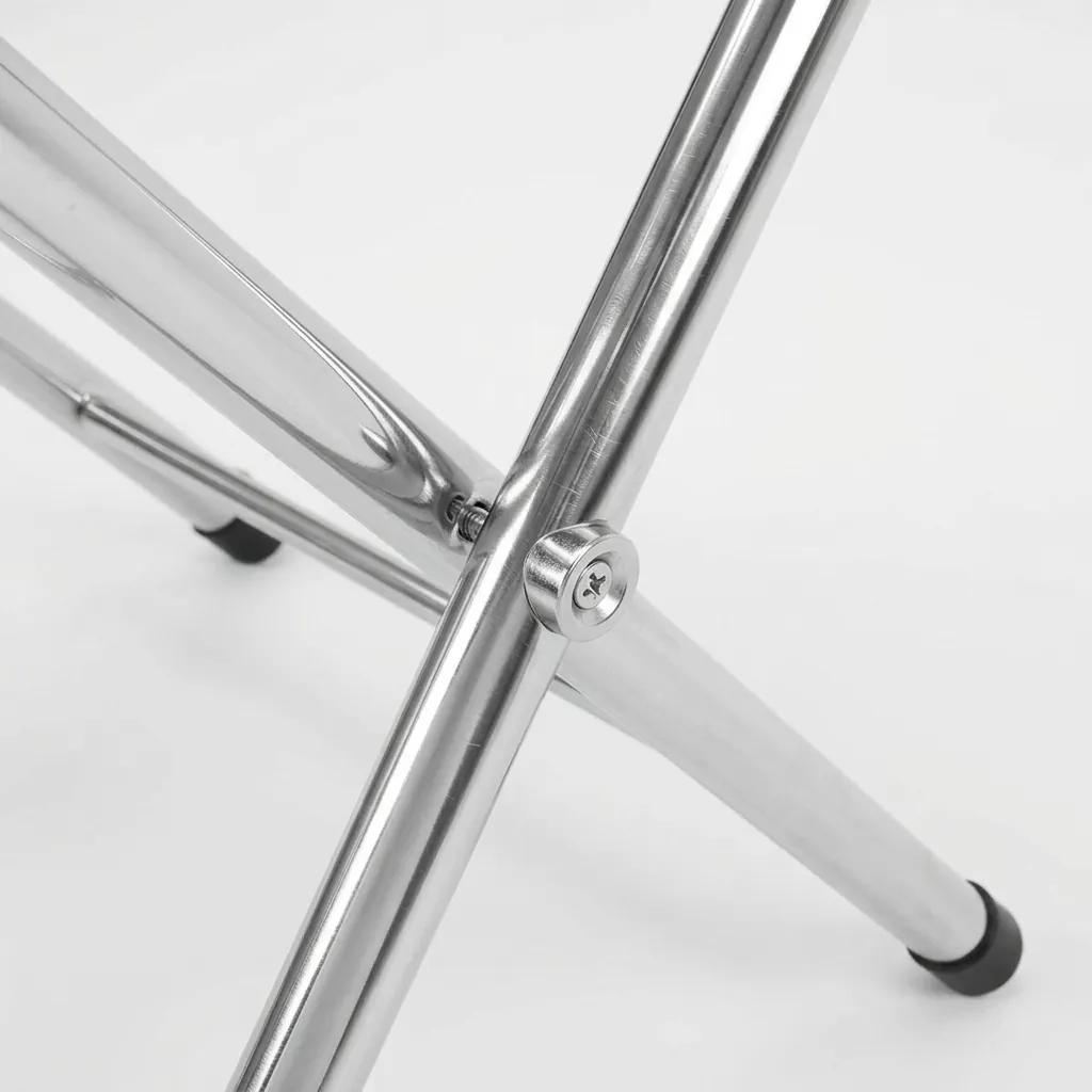 Folding Luggage Rack With Backrest Stainless Steel — LGR-1025 — A folding luggage rack with a strong metal frame, four durable nylon straps and a backrest that protects the wall and holds an open suitcase lid. It folds up easily for compact storage and sets up in seconds. Measures 550x500x700mm, available in black, silver or chrome. (image 5)