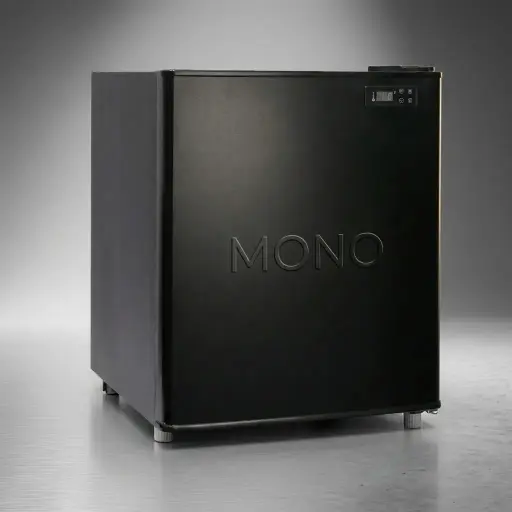 Compressor Mini Bar 42L with Solid Door — MBC-1027 — A 42L compressor minibar with a solid door and a quiet 45dB compressor for reliable cooling between 0 and 10 degrees. A manual thermostat with auto-defrost, two glass shelves and two door racks keep it practical. Eco-friendly R600a refrigerant, measuring 40.5x41.5x58.5cm, in black, white or silver.