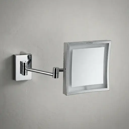 Wall-Mounted 3x Magnifying Mirror with LED Light [1042] — MGM-1042 — A wall-mounted single-sided 3x magnifying mirror with a built-in LED light for clear, close-up grooming. The 21.2cm square copper-framed mirror uses a long-life 60,000-hour LED. Dual-voltage 110/220V.