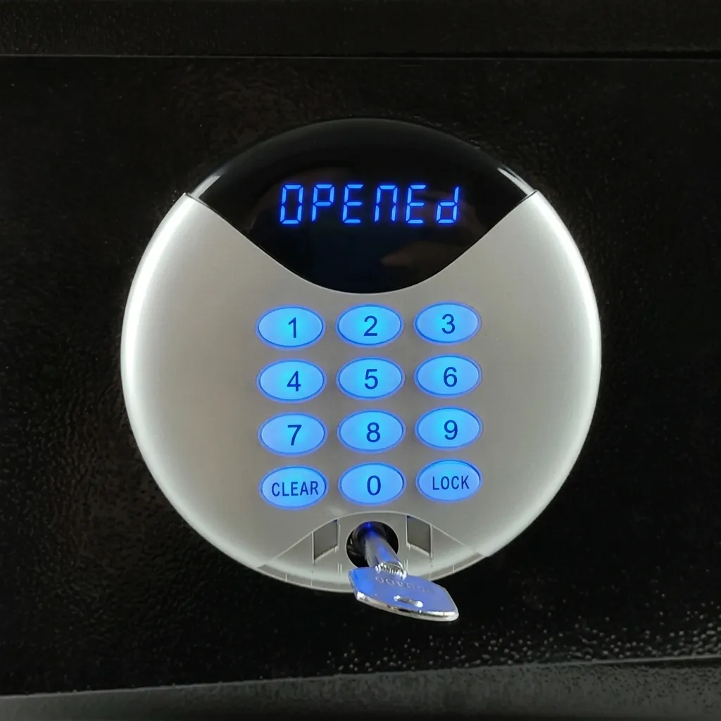Heavy-Gauge Side-Opening Safe with Sand-Texture Finish [1053] — SFB-1053 — A side-opening hotel safe in arc-welded heavy-gauge steel with an 18mm solid steel bolt and a reinforced 5mm door. A backlit LED keypad takes a 3 to 6 digit guest code with master-code and key override, plus a 5-minute lockout. The door opens automatically on the correct code, powered by 4 AA batteries, in black or orange. (image 4)
