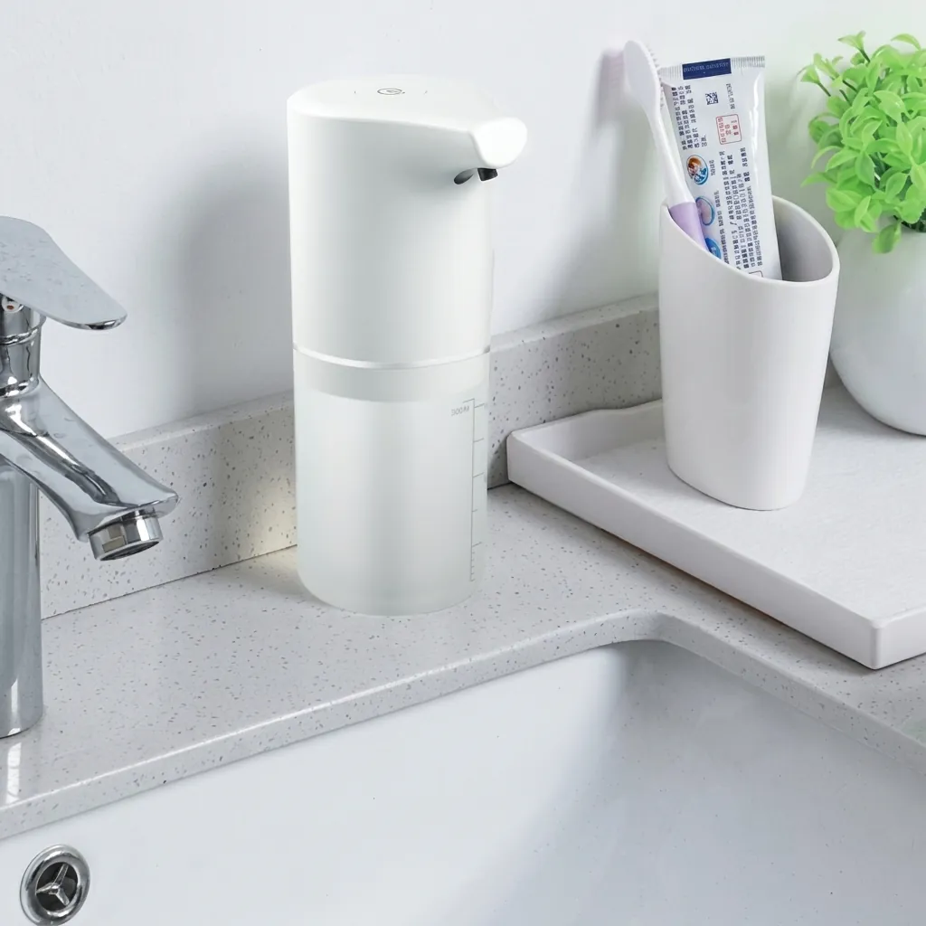 Automatic Table Top Soap Dispenser Touchless — SPD-1032 — A compact touchless tabletop soap dispenser in waterproof ABS with a 350ml reservoir and fast 0.25-second sensing within 5cm. It dispenses foam, spray or gel at a 0.7ml output, powered via a 5V USB input. Lightweight at 0.26kg and measuring 72x89x188mm, finished in white. (image 12)
