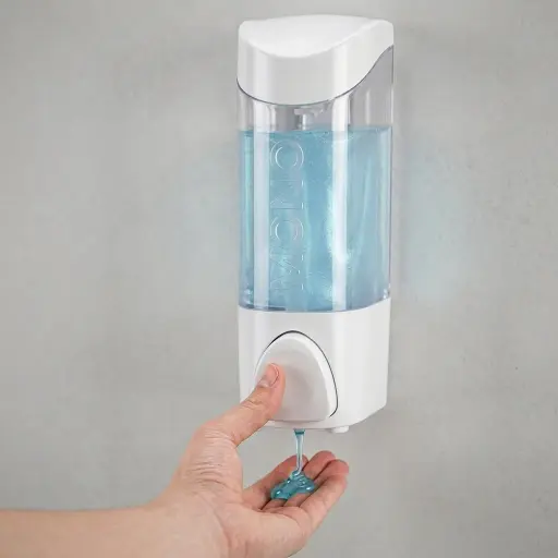 Manual Liquid Soap Dispenser Wall Mounted — SPD-1033 — A wall-mounted manual soap dispenser in PC and ABS with a 300ml reservoir for liquid soap, shampoo or cream. The push pump dispenses cleanly in showers and bathrooms. Measures 65x82x160mm, in white or cream.