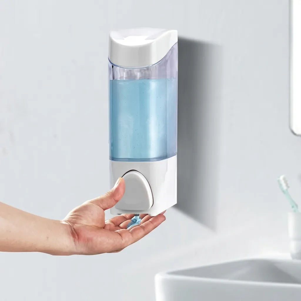 Manual Liquid Soap Dispenser Wall Mounted — SPD-1033 — A wall-mounted manual soap dispenser in PC and ABS with a 300ml reservoir for liquid soap, shampoo or cream. The push pump dispenses cleanly in showers and bathrooms. Measures 65x82x160mm, in white or cream. (image 3)
