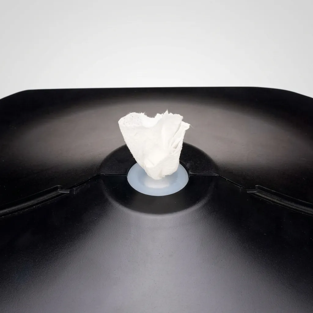 Wet Wipes Dispenser Wall Mounted Silicone Nozzle — SPD-1034 — A wall-mounted wet wipes dispenser in ABS with a silicone nozzle that dispenses sheets one at a time and keeps them moist. It fits standard 22cm-diameter wipe rolls for washrooms and service areas. Measures 32.4x26.6x23.7cm, finished in black. (image 8)