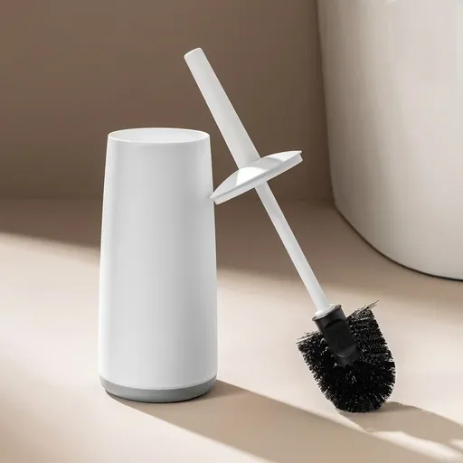 Toilet Brush (White) — TBR-1042 — A freestanding toilet brush in white with soft, flexible curved bristles that reach under the rim for a thorough clean. The PP body stands 37 cm tall on an 11 cm base and suits any bathroom.
