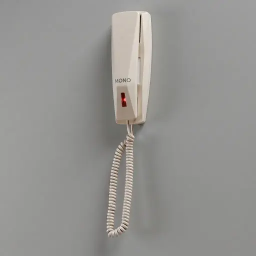 Hotel Desk Telephone [1049] — TEL-1049 — A hotel desk telephone with an ergonomic design, soft ring tone and a dedicated SOS emergency call key. Adjustable flash time and ringer control, auto-redial, flash and transfer and mute round out the features, with protection against EMI, moisture and lightning. Desk or wall mountable, finished in beige.