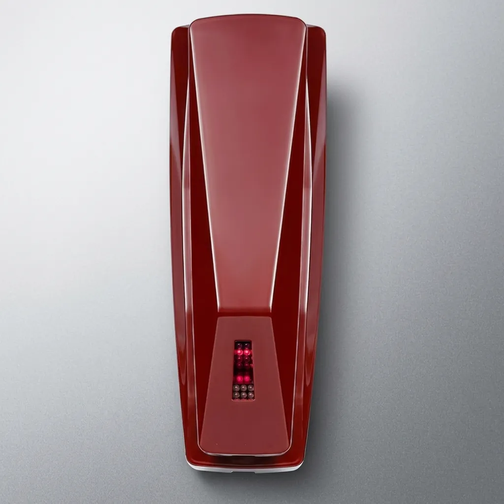 Telephone For Hotel Room - Uv Oil [1052] — TEL-1052 — A hotel room telephone with an ergonomic design and a high-gloss UV-coated shell that resists fading. A soft ring tone, ring-indicator light, SOS emergency key, auto-redial and mute round out the features, with protection against EMI, moisture and lightning. Desk or wall mountable, finished in red. (image 2)