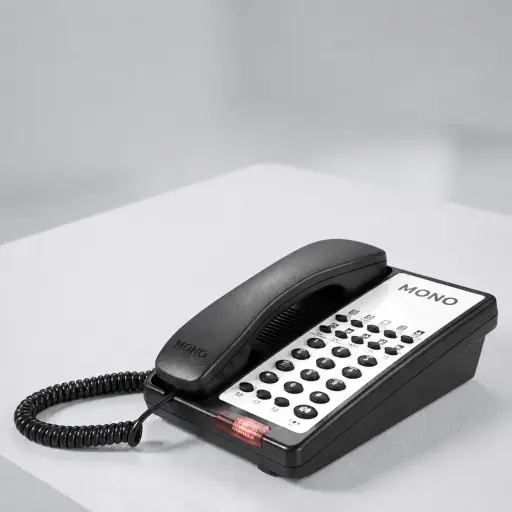 Hotel Desk Telephone with One-Touch Buttons [1066] — TEL-1066 — A hotel desk telephone with a customisable logo panel, one-touch service buttons and three-way talk support. An optional USB charging port, data socket and waterproof, moisture-proof build add convenience, with broad PBX compatibility. Desk or wall mountable, finished in black.
