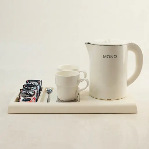 Heat-Resistant ABS 3-in-1 Tray with Stainless Steel Drip Tray [1059] — WTR-1059 — A three-in-one wood-grain ABS welcome tray with a fixed kettle base, four sachet-and-spoon compartments and space for two cups. A removable 304 stainless steel drip tray and rounded corners make it easy to clean. Measures 44.3x22.7x3.6cm, in black or white.