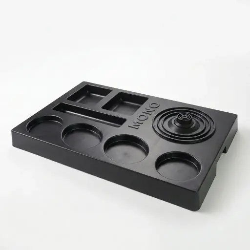 Heat-Resistant ABS 3-in-1 Tray [1064] — WTR-1064 — A three-in-one matt ABS welcome tray with a fixed kettle base and three sachet-and-spoon compartments. Indentations hold two water bottles and two mugs, with rounded corners and a water-resistant build for easy cleaning. Measures 40.5x27x4cm, finished in black.